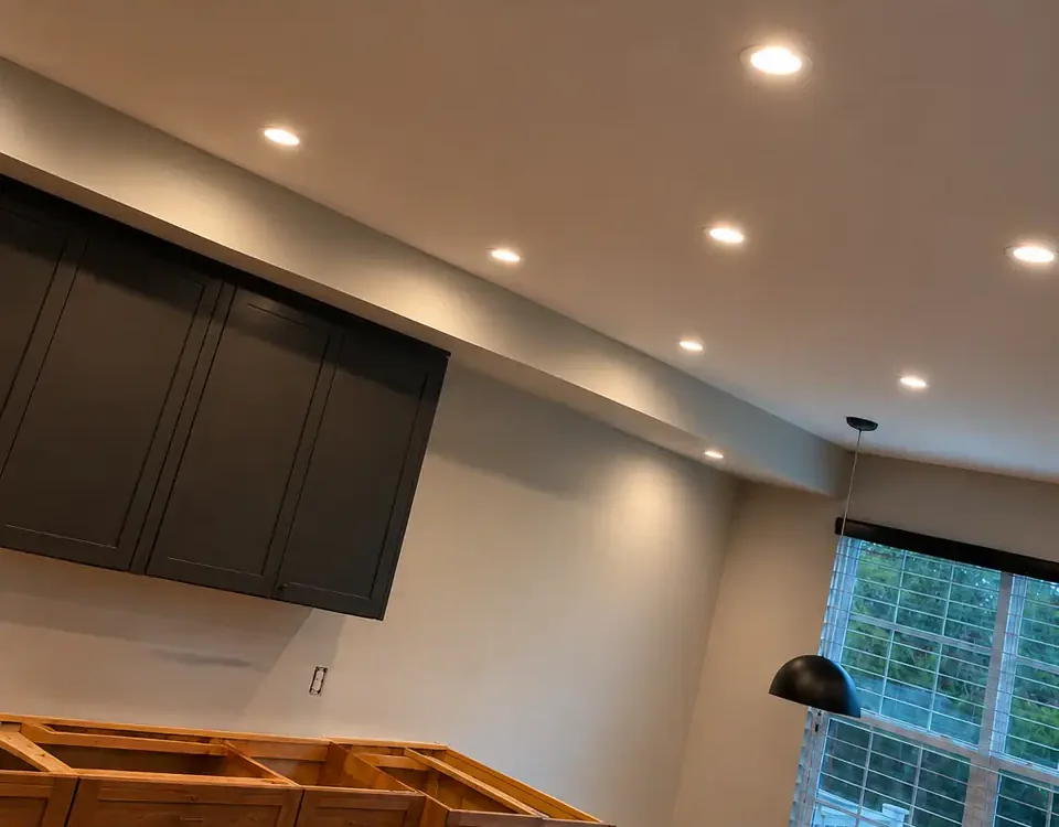 Recessed LED ceiling lighting installed in a Raleigh living room