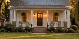 Small frame mill house with a porch