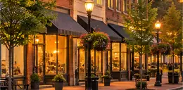 Row of older brick storefronts on a main street