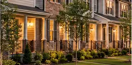 Row of new townhomes with small front yards