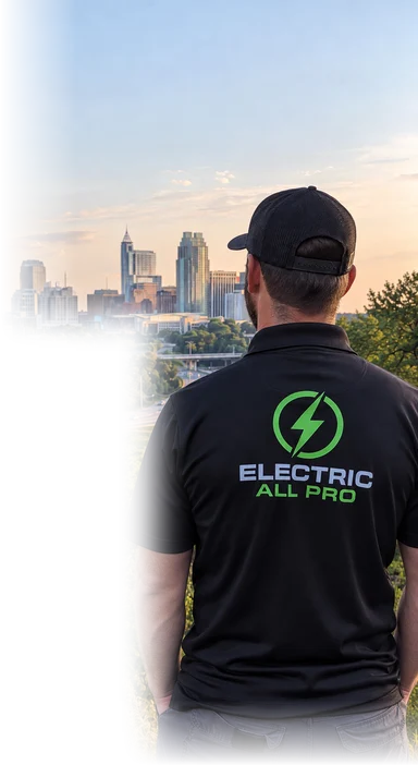 Electric All Pro electrician looking toward the Raleigh skyline