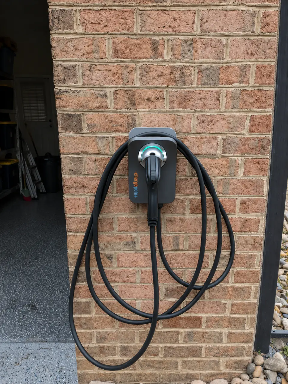 Wall-mounted Level 2 EV charger installed at a Brier Creek home in Raleigh